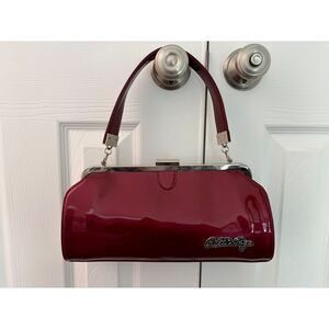 Bettie Page red metallic vinyl kiss lock purse